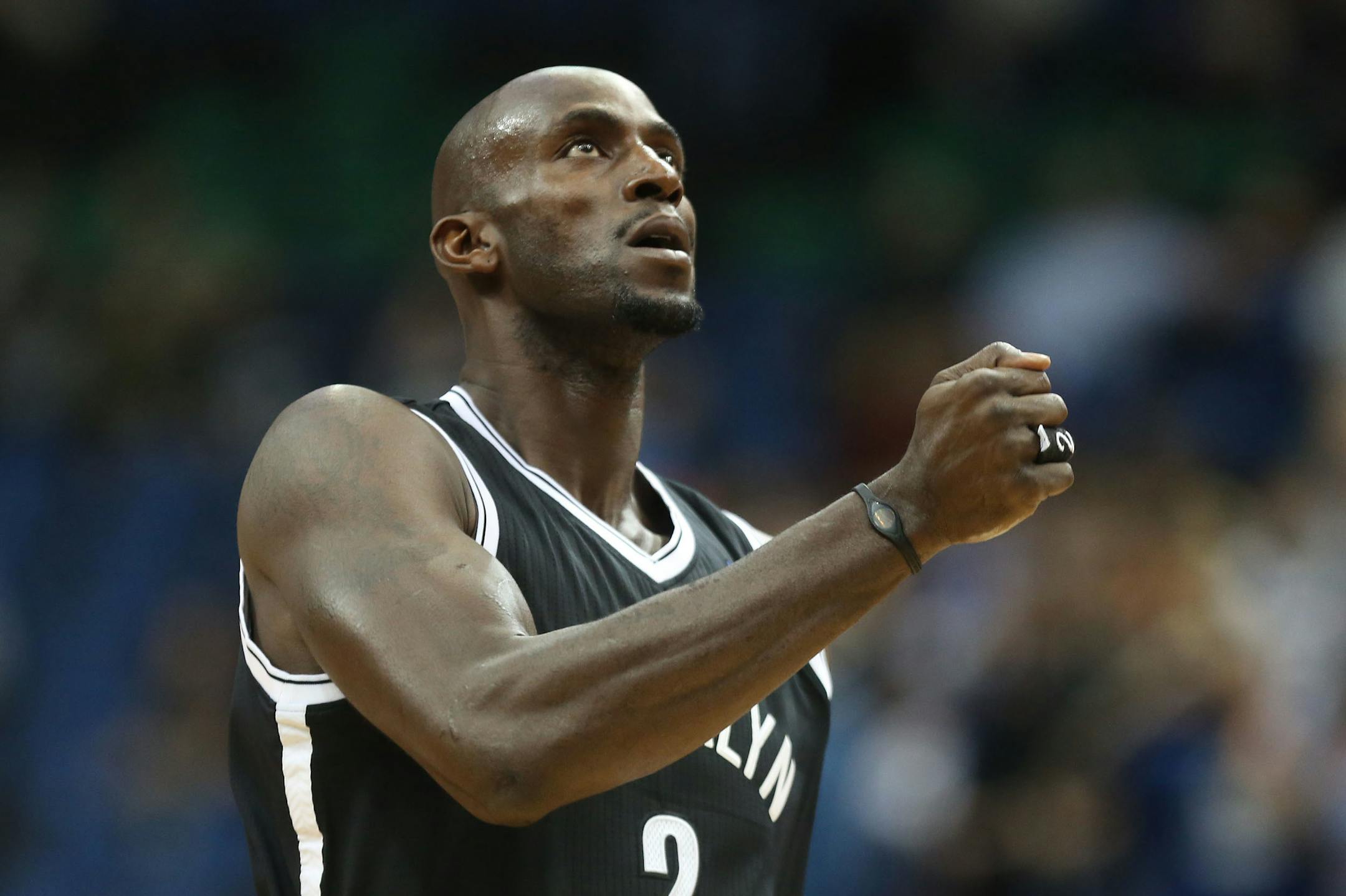 The Nets' Kevin Garnett acknowledged the crowd before the first half at the Target Center in Minneapolis. Garnett, who was drafted by the Wolves in 1995, was traded back to the team on Thursday.
