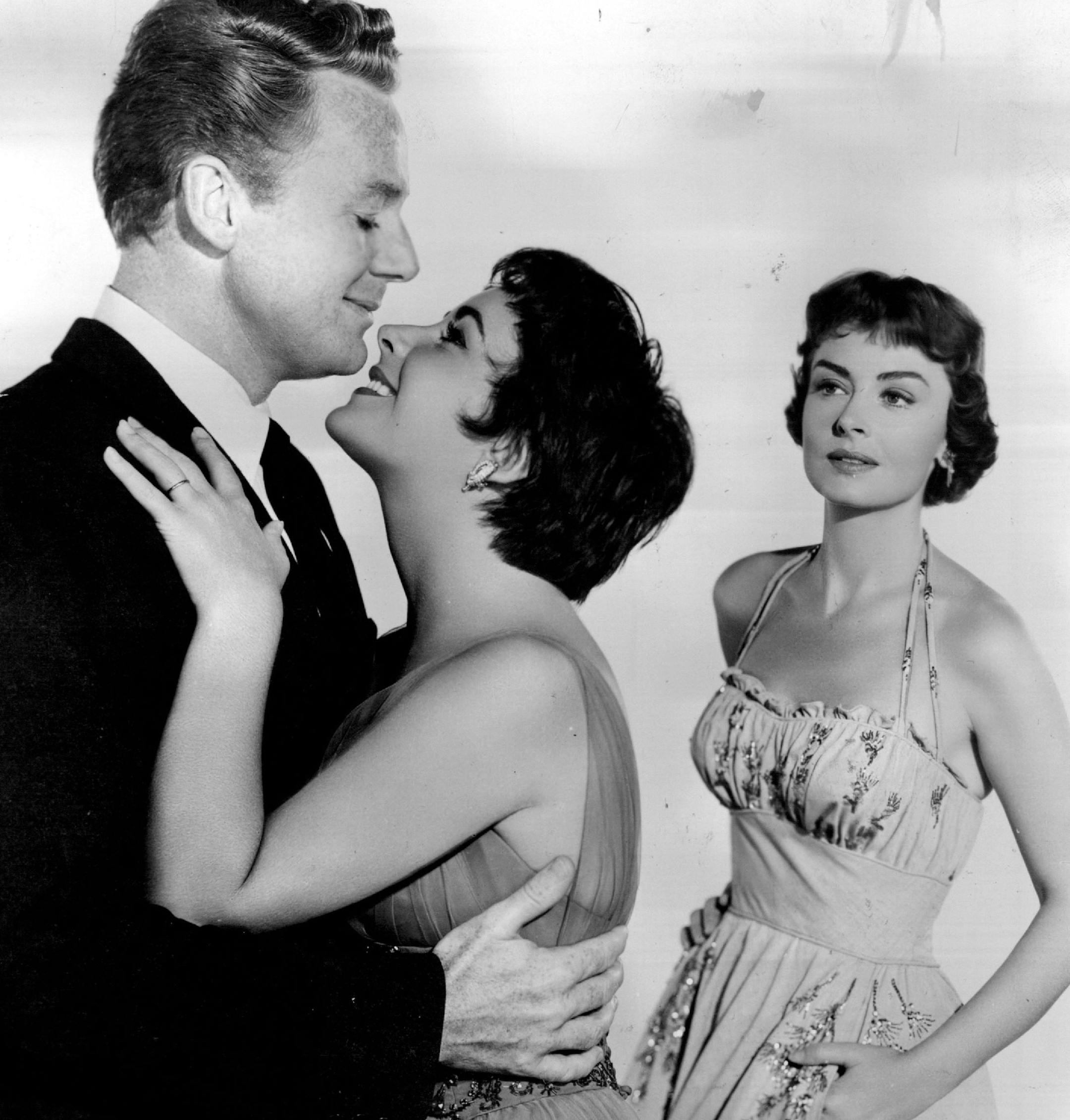 November 21, 1954 Lovers in Paris Van Johnson and Elizabeth Taylor are principals in '"The Last Time I Saw Paris," coming up Thursday at the State. It's based on an F. Scott Fitzgerald story about high life in the French metropolis. Standing by is Donna Reed. ORG XMIT: MIN2017012902205597