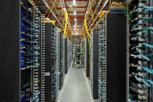 Racks of servers at the new Amazon Web Services facility in New Carlisle, Ind., where the tech giant plans to build around 30 data centers, on June 3, 2025.