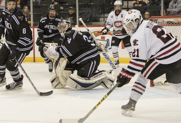 St. Cloud State forward Jimmy Murray (21) got ready to shoot on MSU Mankato goalie Cole Huggins. His shot went in for the winning goal.