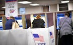 Voters cast their ballots at a voting center in Minneapolis Friday, Sept. 23, 2016. Friday kicked off the state's early voting period, making Minnesot