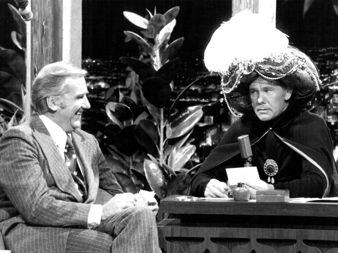 Ed McMahon, left and Johnny Carson (as Carnac the Great) ham it up on "The Tonight Show."