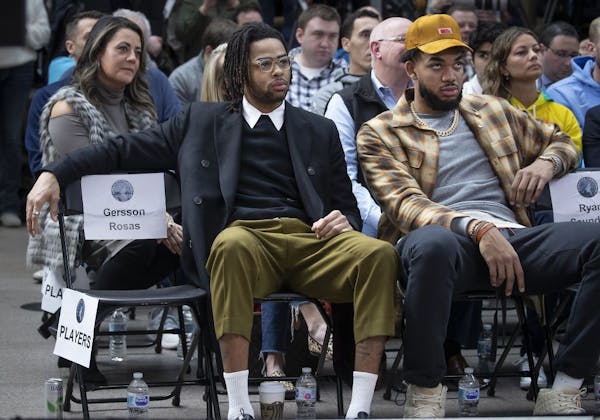 D'Angelo Russell, left, and Karl-Anthony Towns sat together during the press conference that introduced Russell at City Center.