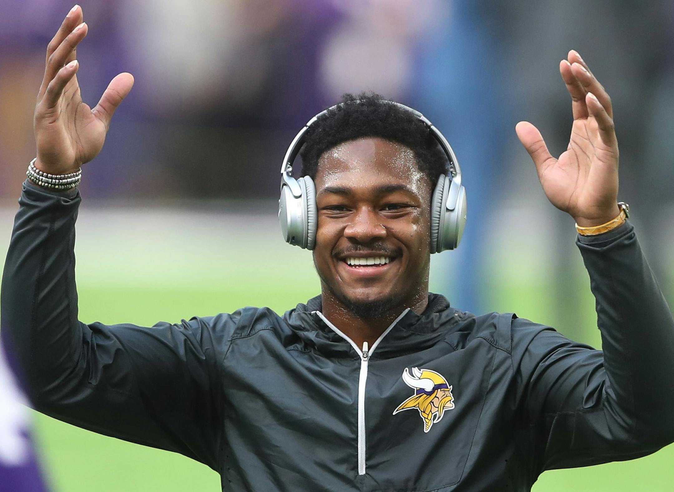 Minnesota Vikings wide receiver Stefon Diggs (14) reacts after Wyatt Ficken 5, of Eden Prairie caught a pass from him during warmups at U.S. Bank Stadium Sunday November 19, 2017 in Minneapolis, MN.] JERRY HOLT ï jerry.holt@startribune.com