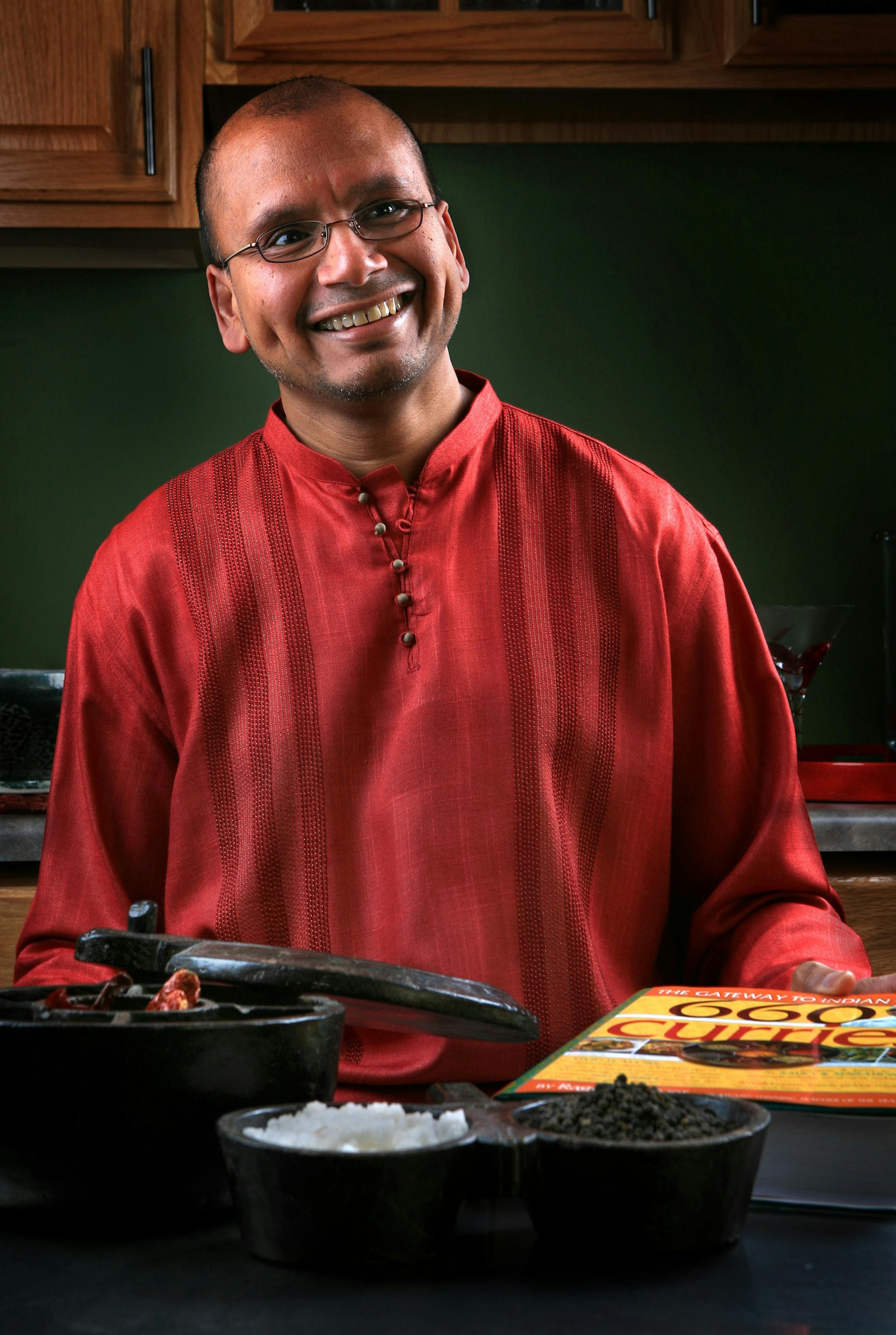 Steve Rice ï srice@startribune.com Eden Prairie, MN 04/06/2008] Raghavan Iyer, the author of "660 Curries" in his home.