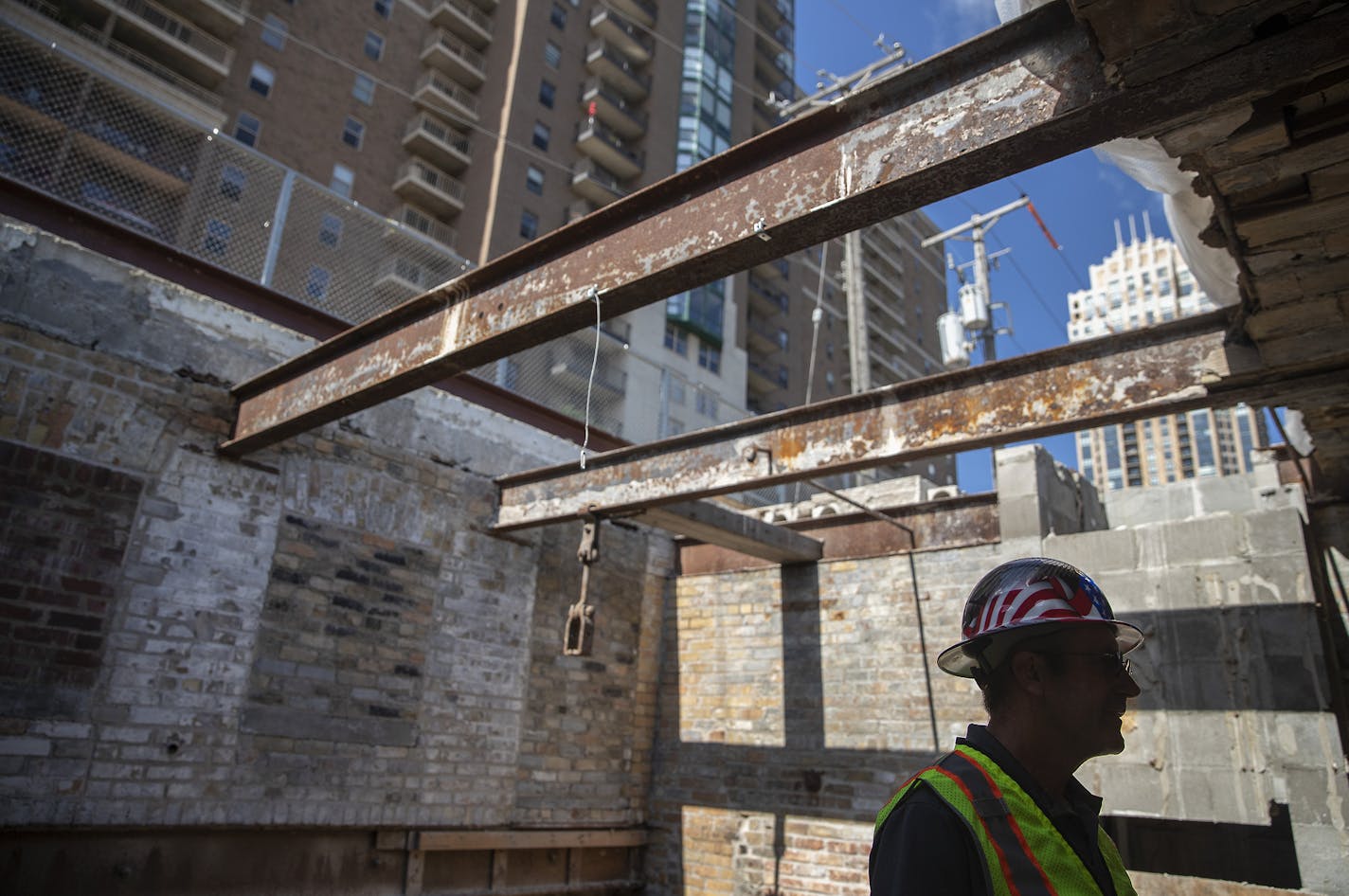 Rich Mickschl, cq, left, the project superintendent of H+U Construction gave a tour of the mill ruins they've unearthed after an official shovel ceremony for Water Works, Wednesday, August 28, 2019 in Minneapolis, MN. Water Works is a multimillion dollar project that will radically change the look of the riverfront. What's interesting is that they've unearthed historic mill remnants that will be a main feature of the project. ] ELIZABETH FLORES &#x2022; liz.flores@startribune.com