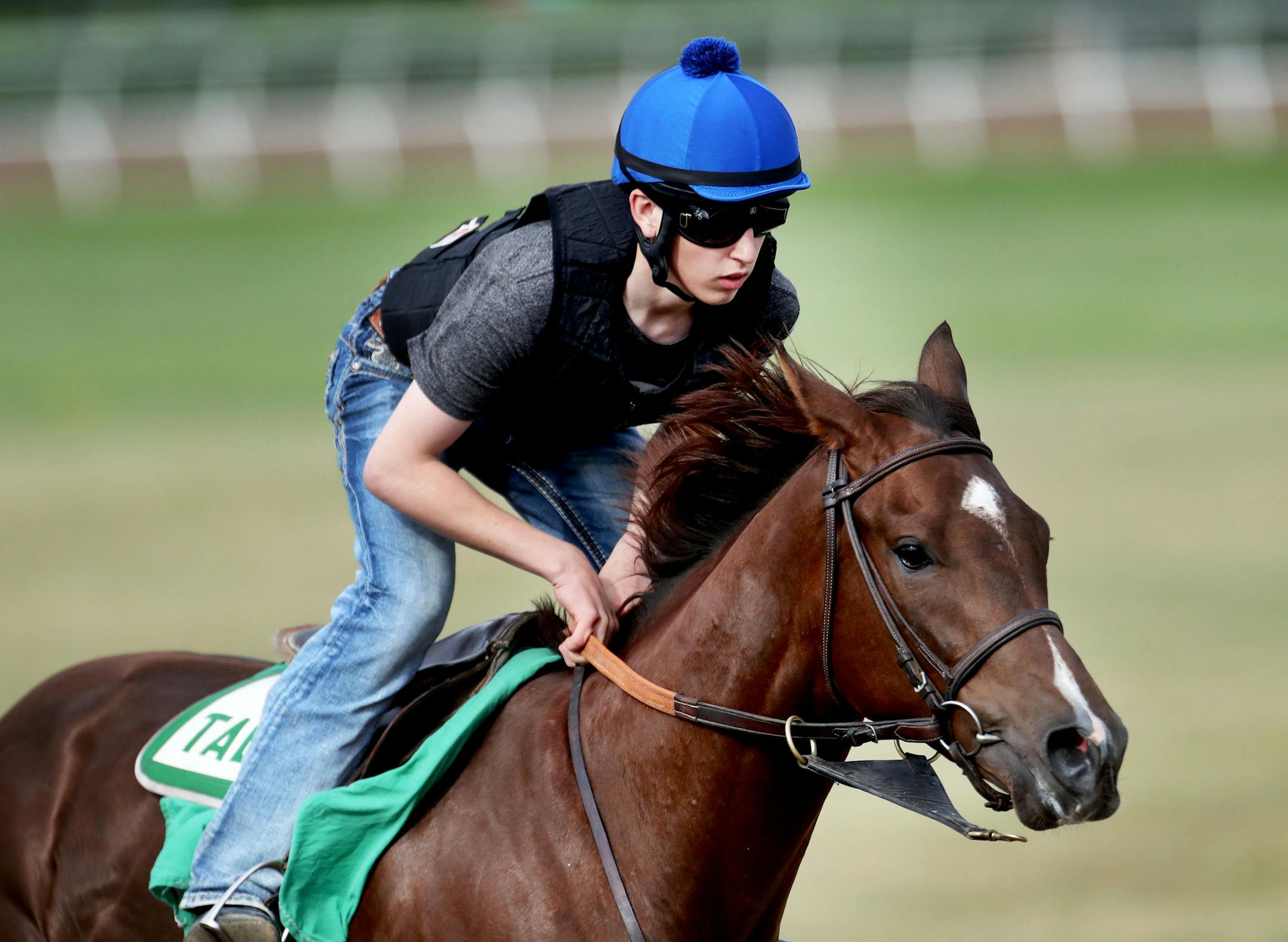 Young jockey Scott Bethke, 16, who is home schooled and doesn't even have his drivers license yet, recently transitioned from being a horse exerciser to a jockey and was seen galloping Little Tammy Canterbury Park Thursday, June 30, 2016, in Shakopee, MN.](DAVID JOLES/STARTRIBUNE)djoles@startribune Young jockey Scott Bethke, 16, who is home schooled and doesn't even have his drivers license yet recently transitioned from being a horse exerciser to a jockey.