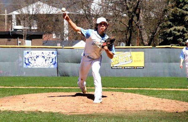 Blaine pitcher Sam Riola delivers a pitch during a game against Forest Lake in which he picked up the victory.