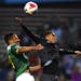 Tampa Bay Rowdies defender Tamika Mkandawire (17) and Minnesota United FC forward Stefano Pinho (11) went up for a header in the second half Saturday.