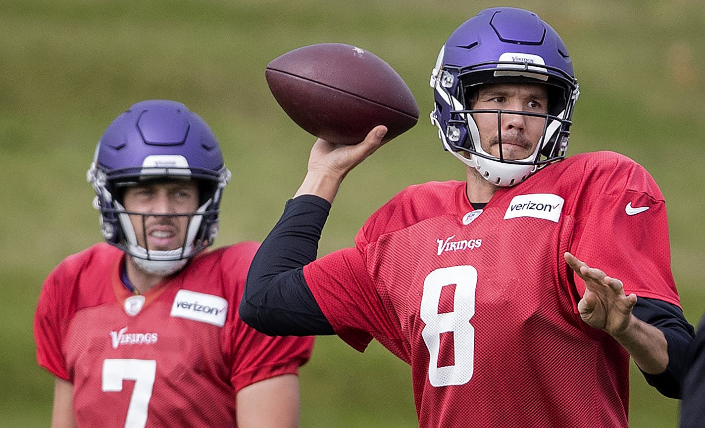 Minnesota Vikings quarterbacks Sam Bradford (8) and Case Keenum (7).