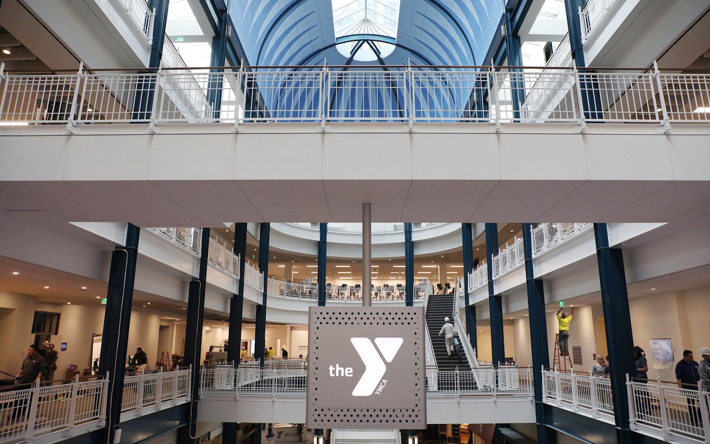 Construction workers readied the new YMCA on Nicollet Mall for it's opening later this week. ] ANTHONY SOUFFLE &#xef; anthony.souffle@startribune.com Workers readied the new YMCA on Nicollet Mall for it's opening later this week Wednesday, Jan. 24, 2018 in the Gaviidae Common building in downtown Minneapolis. The new $30 million space is five floors of the building and includes some national firsts including an equity innovation lab, a wellbeing center for yoga and meditation, a huge spinning th