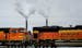 A BNSF train waits on the tracks near the Sherco power plant in Becker, Minn.¬† Rail delays are affecting the energy¬† sector, especially shipme