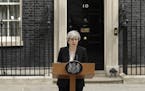 British Prime Minister Theresa May addresses the media outside 10 Downing Street, London, Tuesday May 23, 2017, the day after an apparent suicide bomb