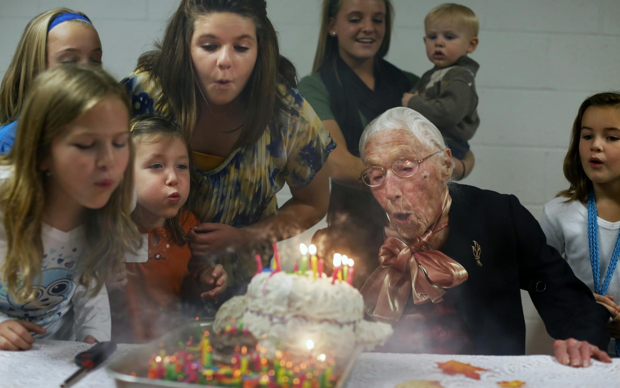 Anna Stoehr blew out the 112 candles on her birthday cake with the help of her great-grandchildren Sunday at the American Legion club in Millville, Minn. Stoehr is believed to be the oldest independently living person in the world.