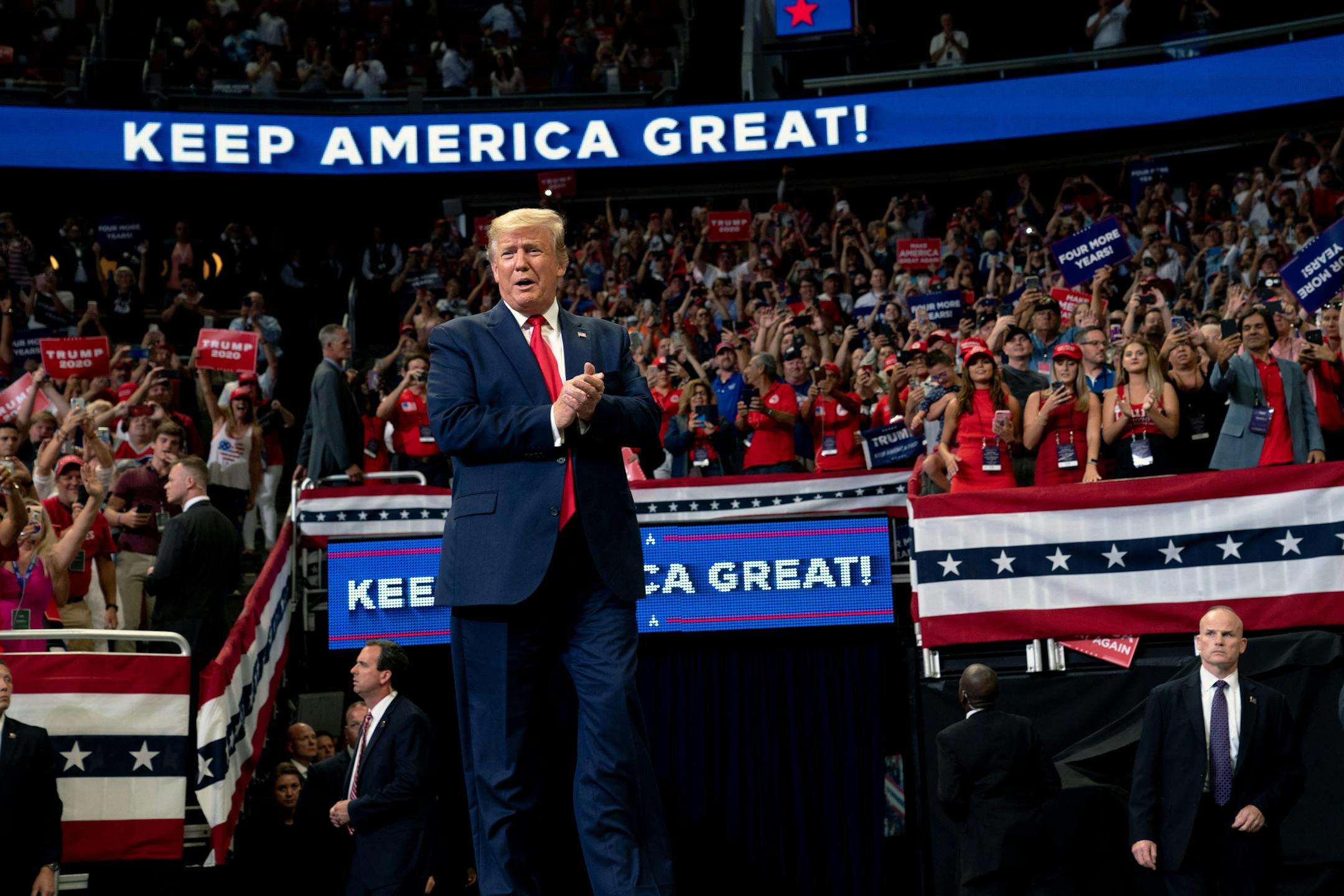 President Donald Trump is cheered by supporters at a rally in Orlando, Fla., on Tuesday night, June 18, 2019. Trump delivered a fierce denunciation of the news media, the political establishment and what he called his radical opponents on Tuesday as he opened his re-election campaign in front of a huge crowd of raucous supporters by evoking the dark messaging and personal grievances that animated his 2016 victory. (Erin Schaff/The New York Times)