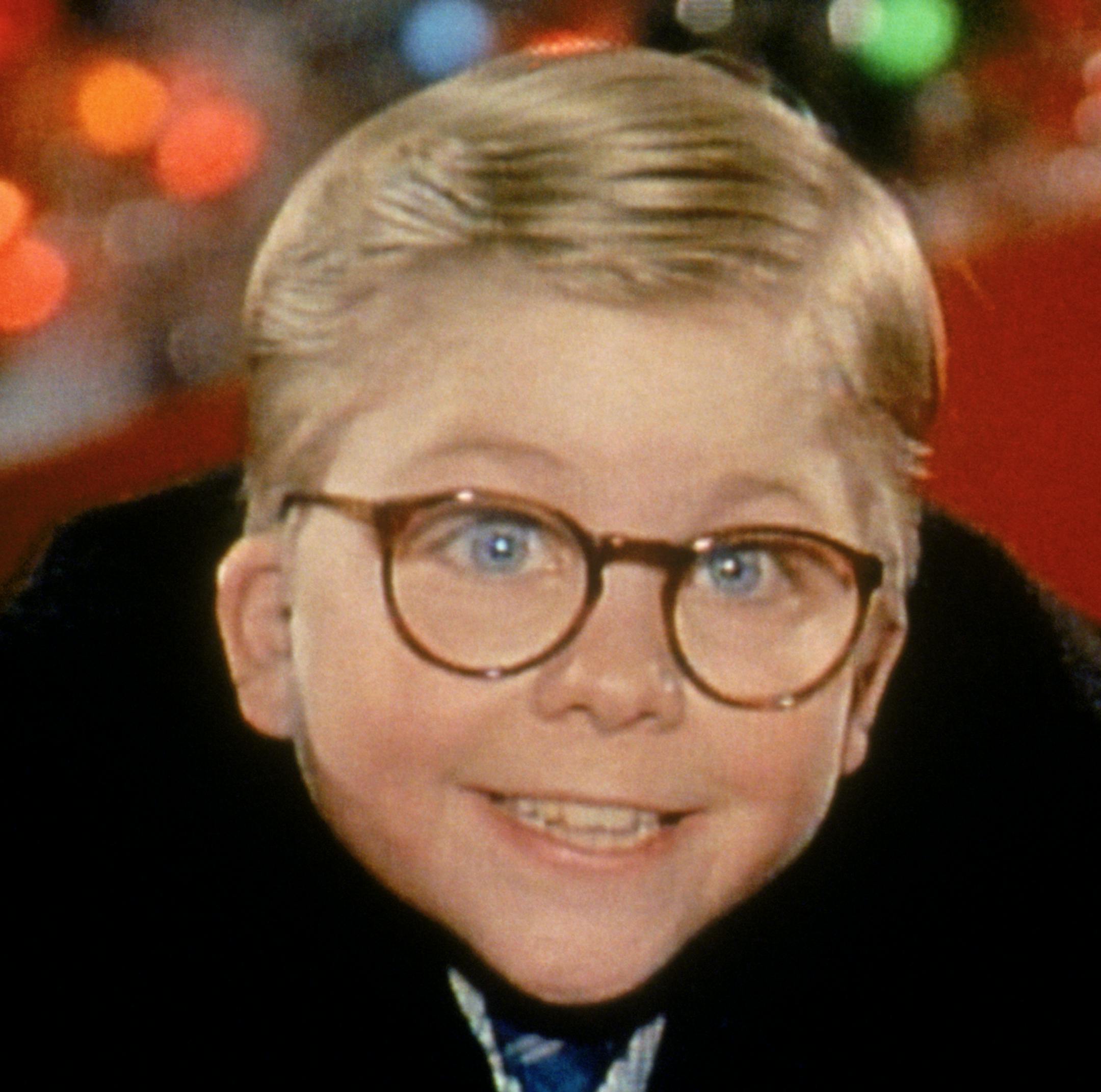 In a still from the movie "A Christmas Story," Ralphie (played by Peter Billingsley) hops on a slide just after visiting Santa Claus in Higbee's Department Store ] Credit: Turner Entertainment