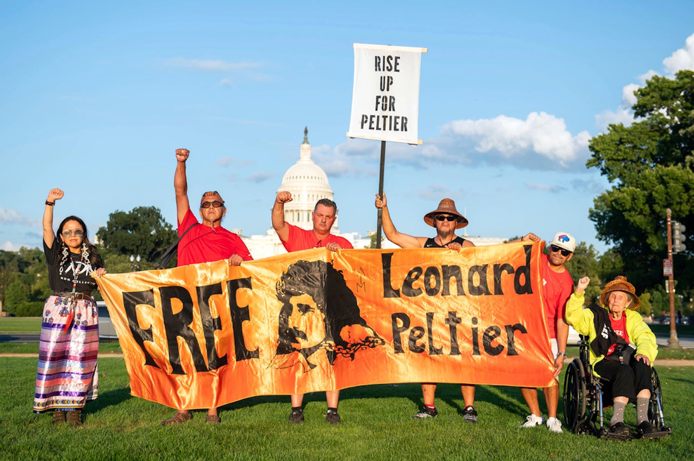 IMAGE DISTRIBUTED FOR NDN COLLECTIVE AND AMNESTY INTERNATIONAL USA - Organized by NDN Collective and Amnesty International, over 200 people gather on the National Mall on Monday evening in preparation for a rally to be held on September 12th at the White House in support of imprisoned Native American activist Leonard Peltier on Monday September 11, 2023 in Washington. (Joy Asico/AP Images for NDN Collective and Amnesty International USA)