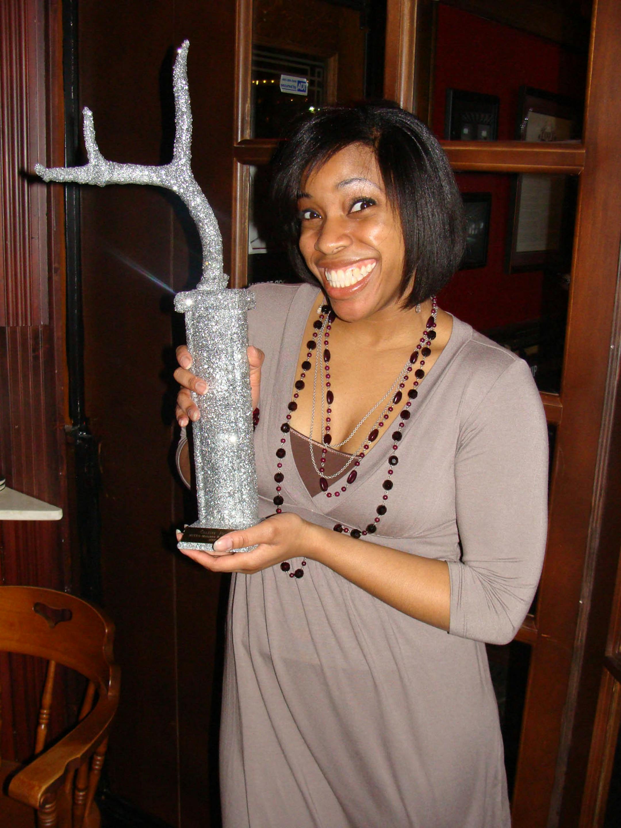 Actress Celeste Jones posed with her Keeper trophy.