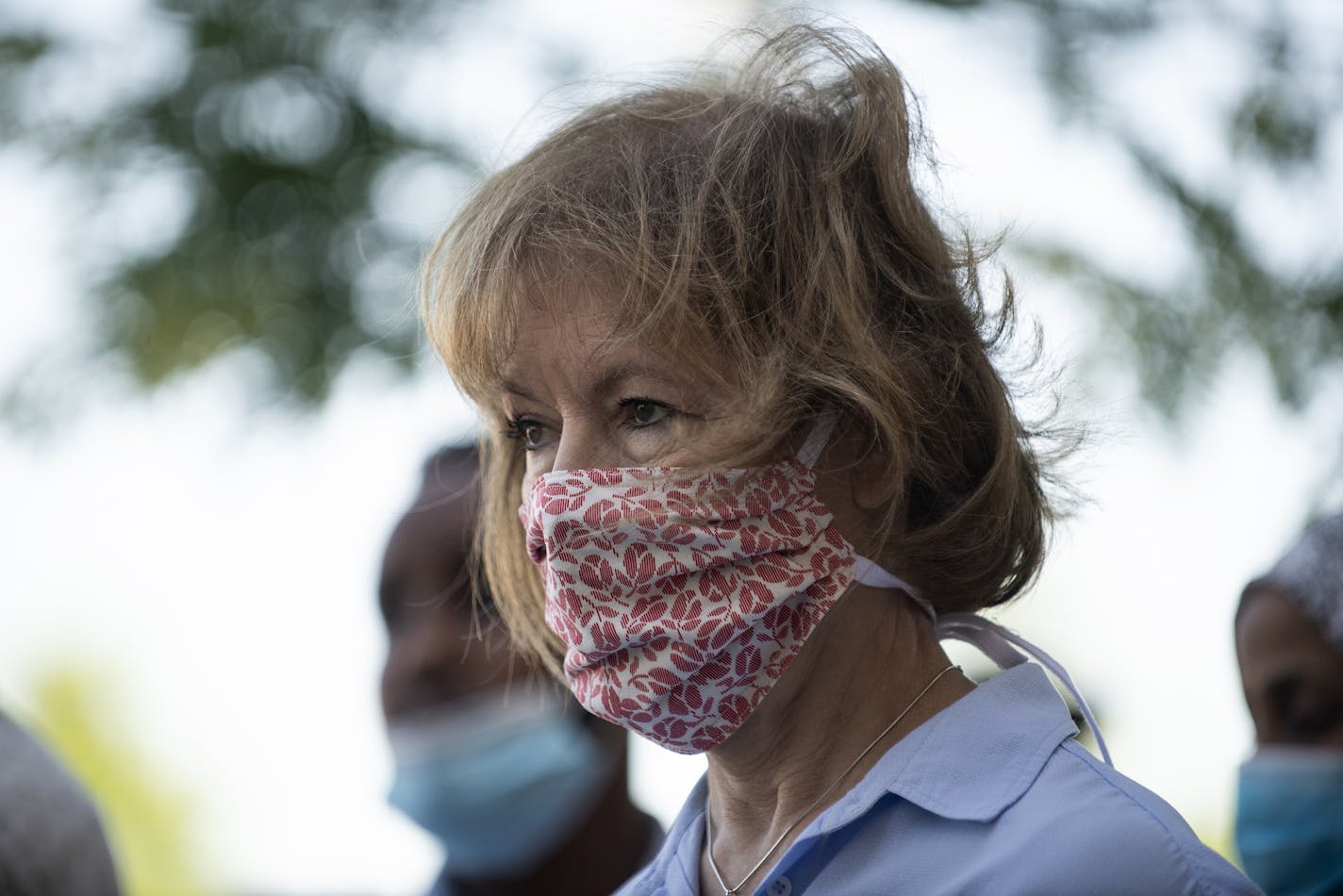 Sen. Tina Smith (D-Minnesota) listens as local business owners speak outside the Midtown Global Market on June 5, 2020 in Minneapolis, Minnesota. The politicians joined business owners and community members to tour some of the damage to their businesses and properties, which happened during the protests and riots in Minneapolis after the death of George Floyd. (Stephen Maturen/Getty Images/TNS) ORG XMIT: 1780651