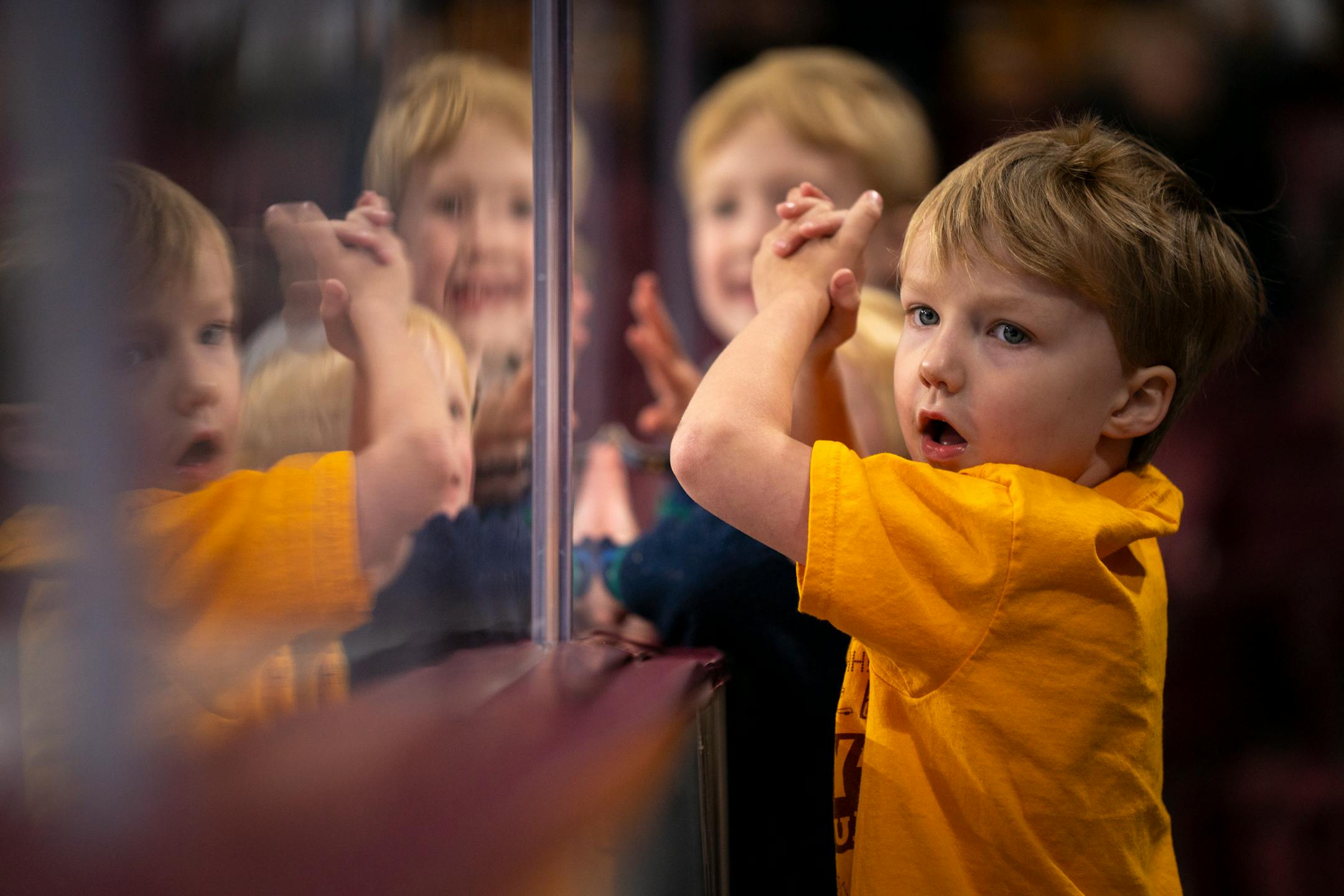 Monty Miller and his other young fan friends cheer on the Gophers at the exhibition game against Bemidji State University.