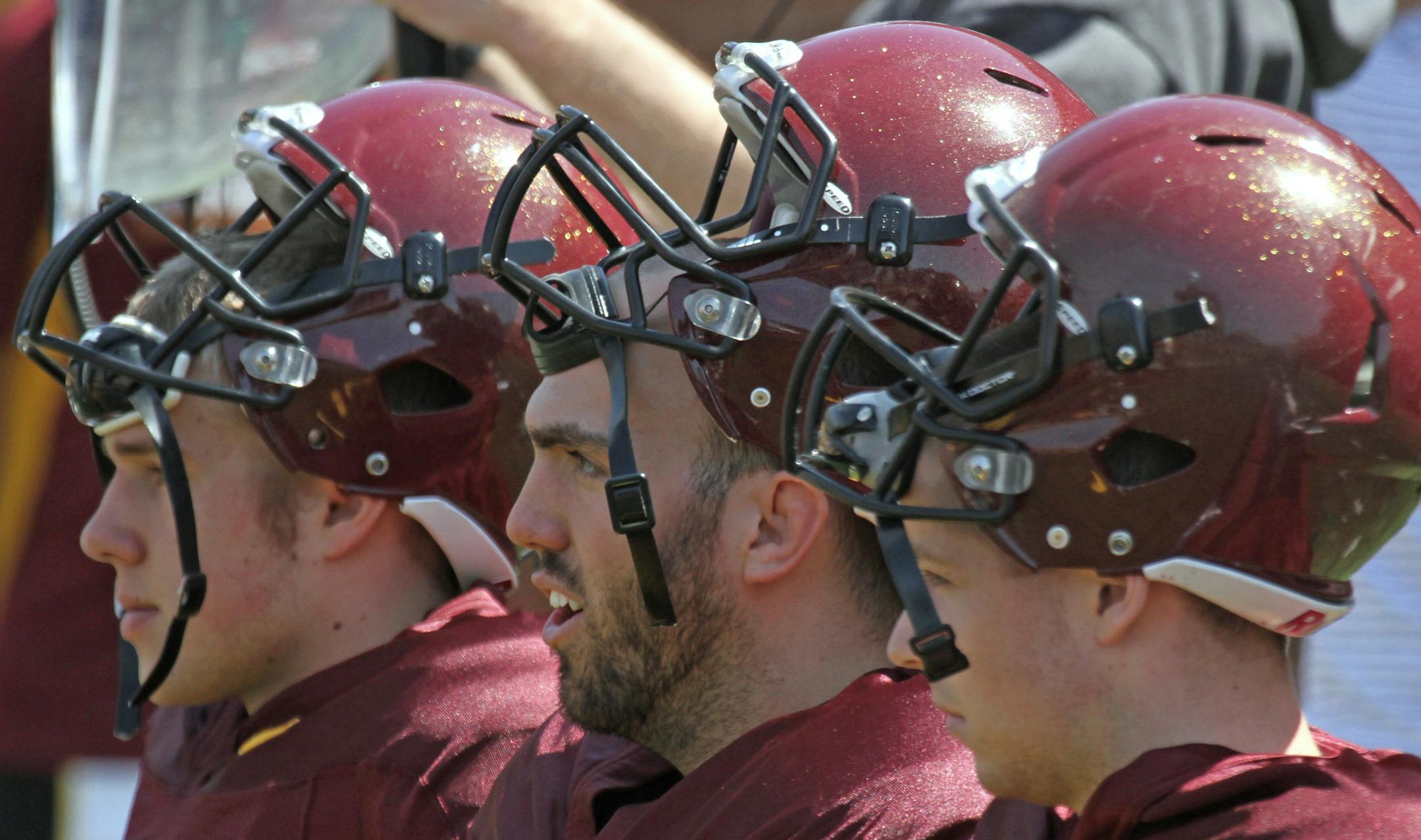 (left to right) Gophers special team members Kyle Fodness, Jake Filkins and Peter Mortell waited on the bench during the spring game at TCF Stadium on 4/27/13.] Bruce Bisping/Star Tribune bbisping@startribune.com Kyle Fodness, Jake Filkins, Peter Mortell/roster. ORG XMIT: MIN1304271632361358