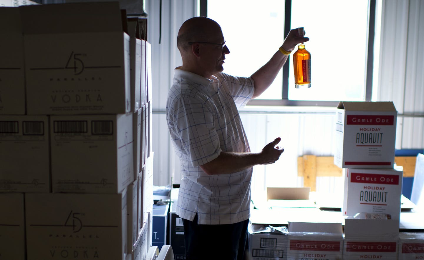 Mike McCarron lost his job in IT and then started a business producing Gamle Ode Aquavit, a traditional Scandinavian spirit flavored with herbs. Tuesday, August 27, 2013 ] GLEN STUBBE * gstubbe@startribune.com