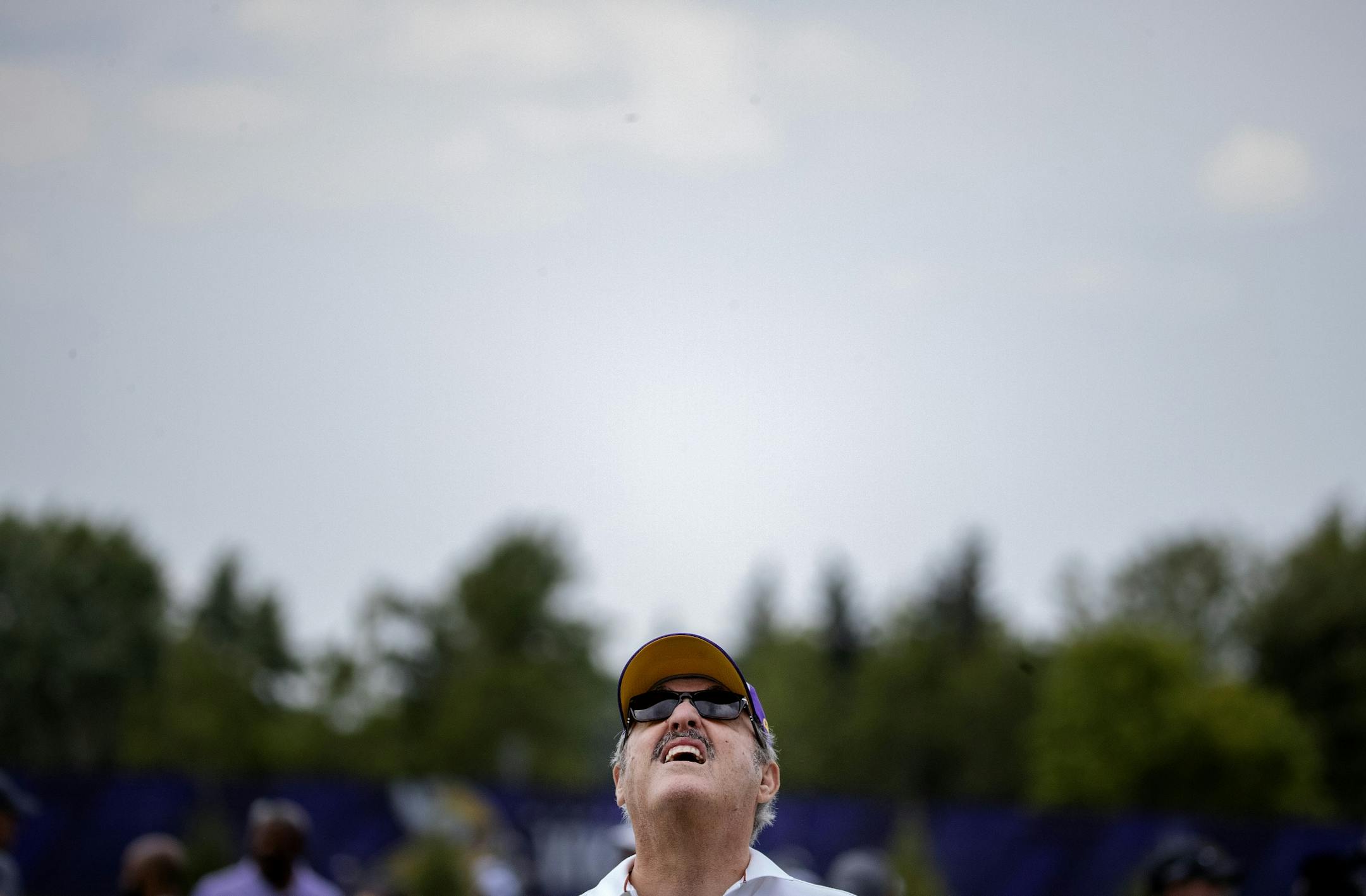 Minnesota Vikings owner Zygi Wilf looked up at the sky. Fans and players were evacuated from the Minnesota Vikings and Jacksonville Jaguars joint practice due to a severe weather warning.