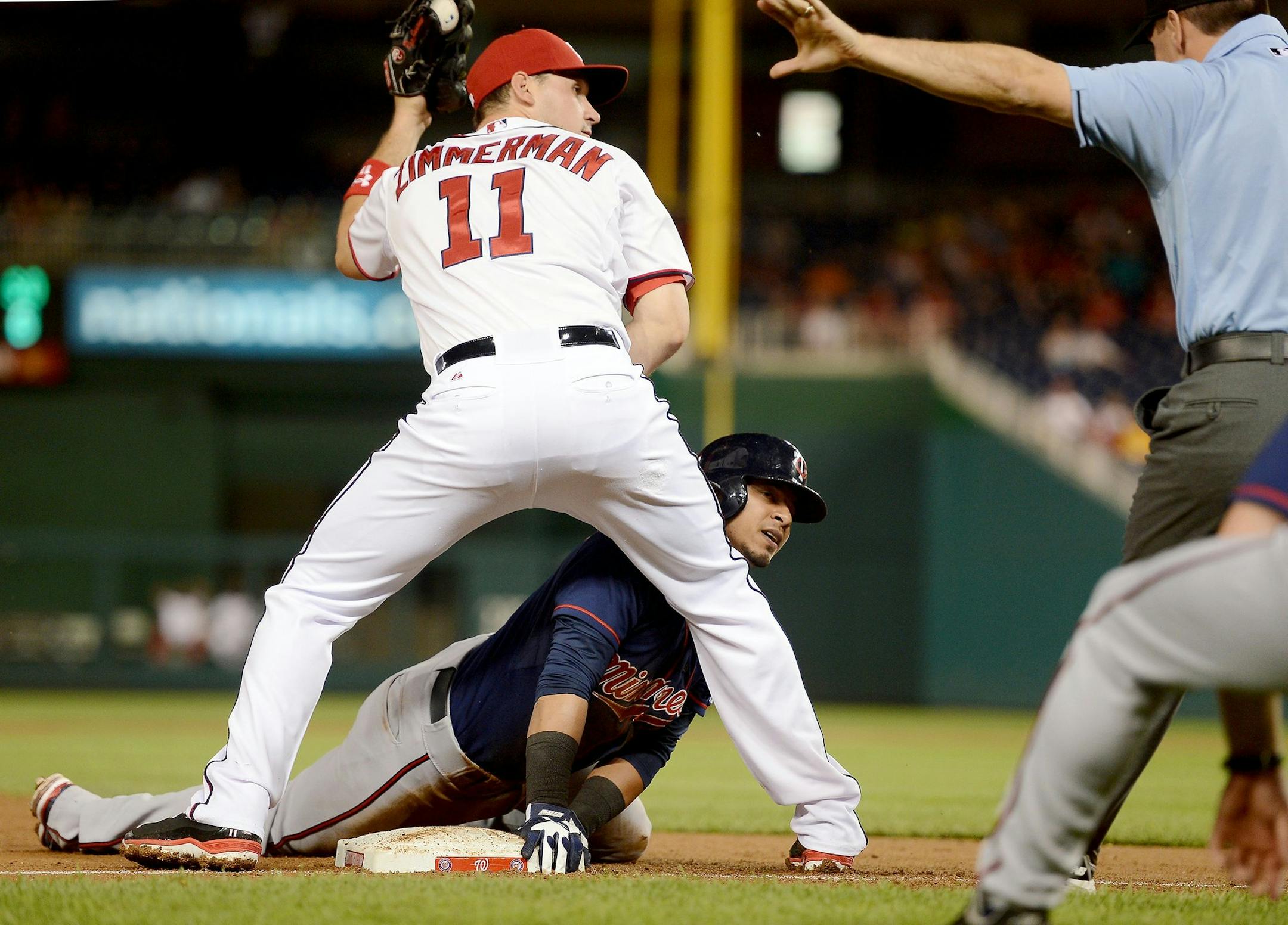 Eduardo Escobar slid into third base for a triple against Washington on June 9.