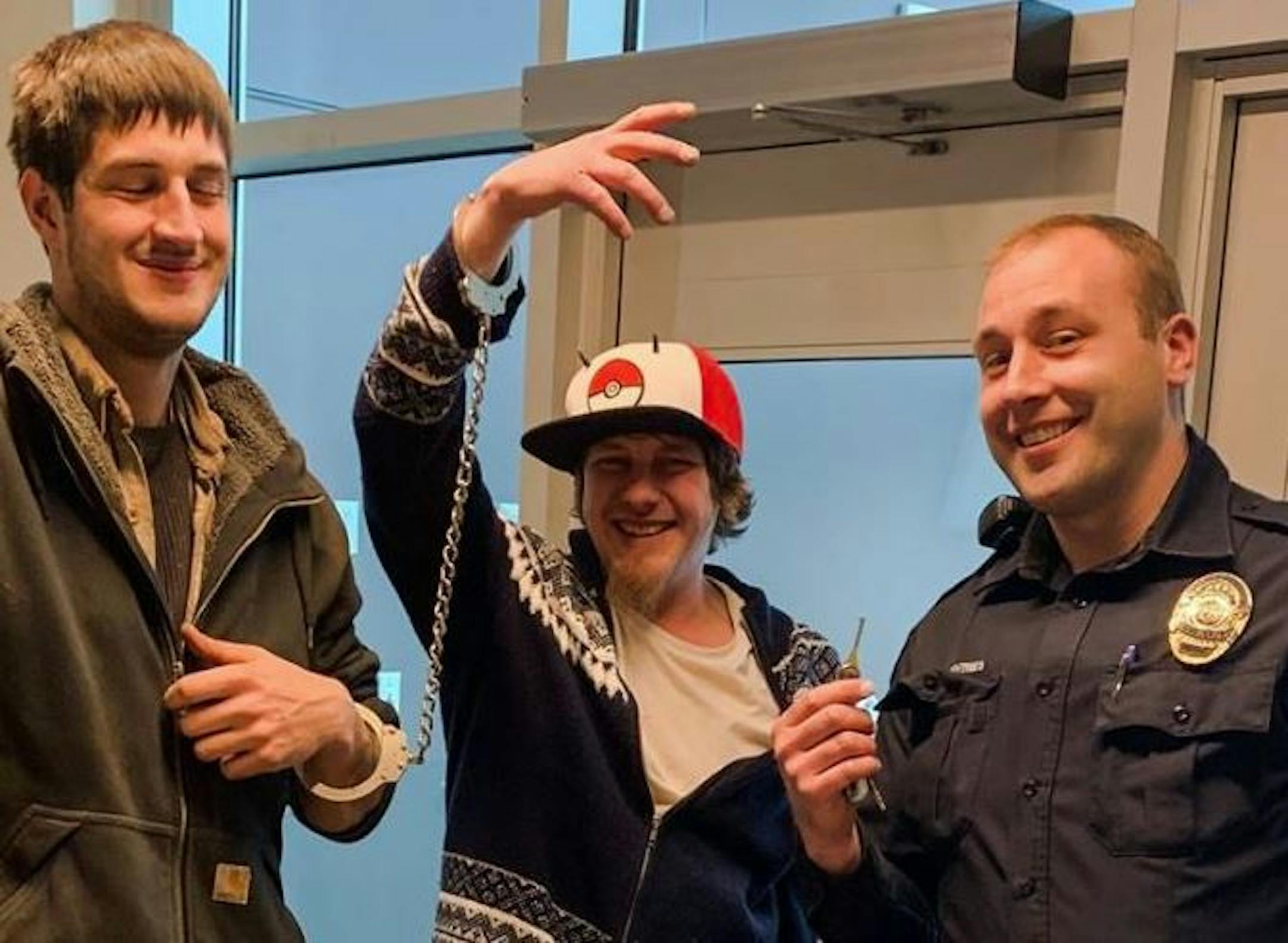 Jeff Jabas, of New Prague, and buddy Zak Wilhelm arrived at police headquarters Wednesday as an accidental tandem. Police officer Aaron Machtemes did the honors.
