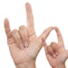 iStockphoto.com Mother and son using American Sign Language to say I Love You.