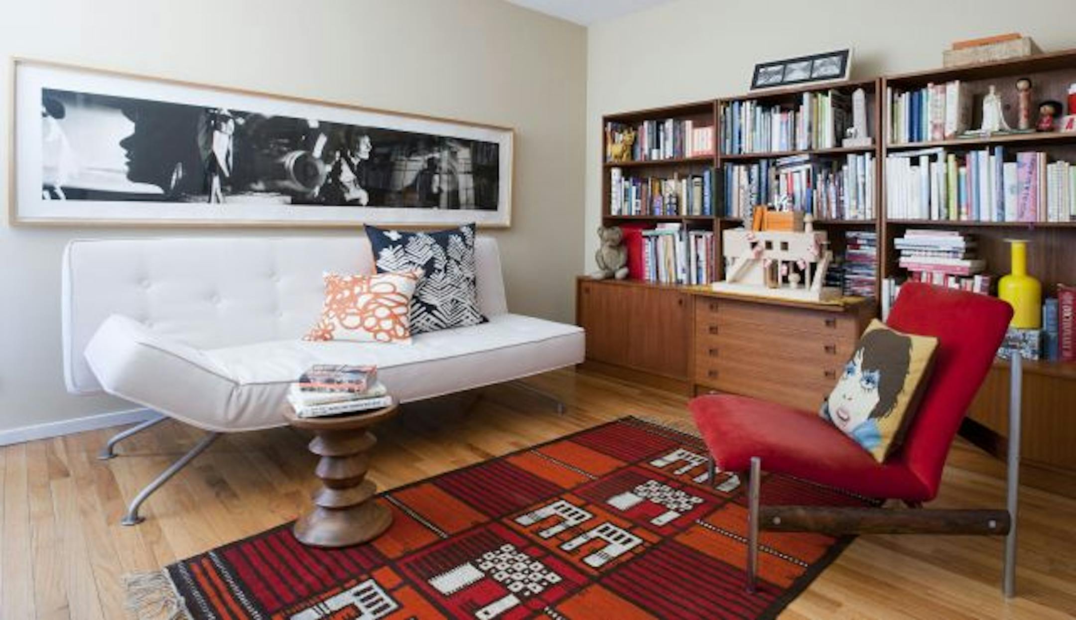 The study is furnished in Scandinavian modern, including a chair by Sven Dysthe and a sofa by Anders Norgaard.