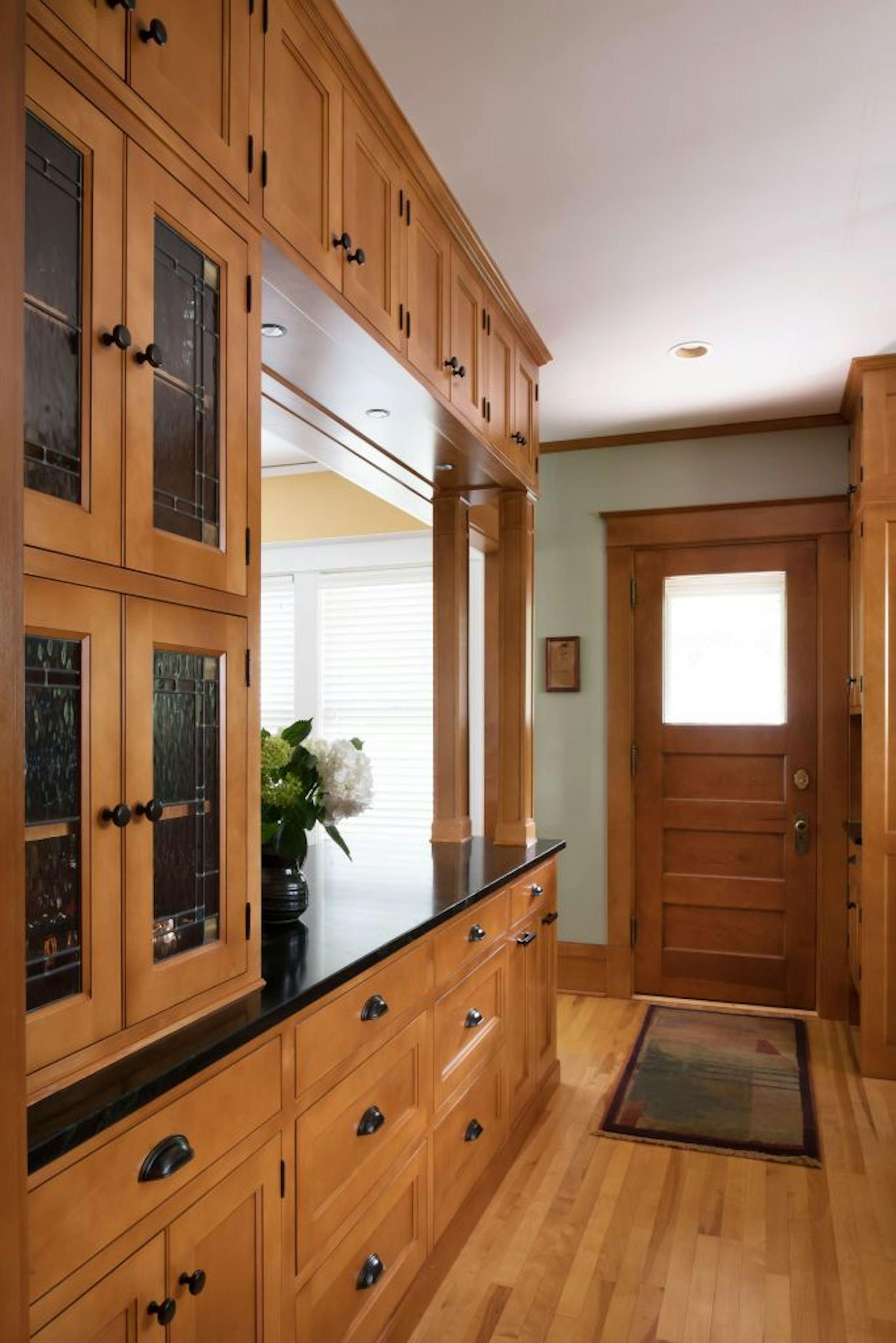 New cabinets were designed to match the original cabinets. Architectural details from elsewhere in the house were incorporated into the new kitchen.