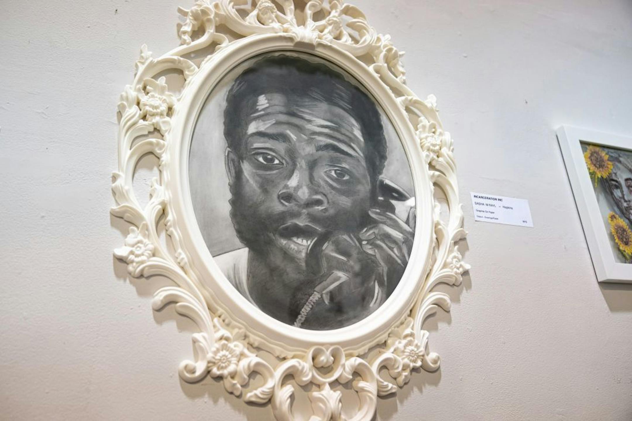Incarceration Inc by Sasha M Rayl, graphite on paper.