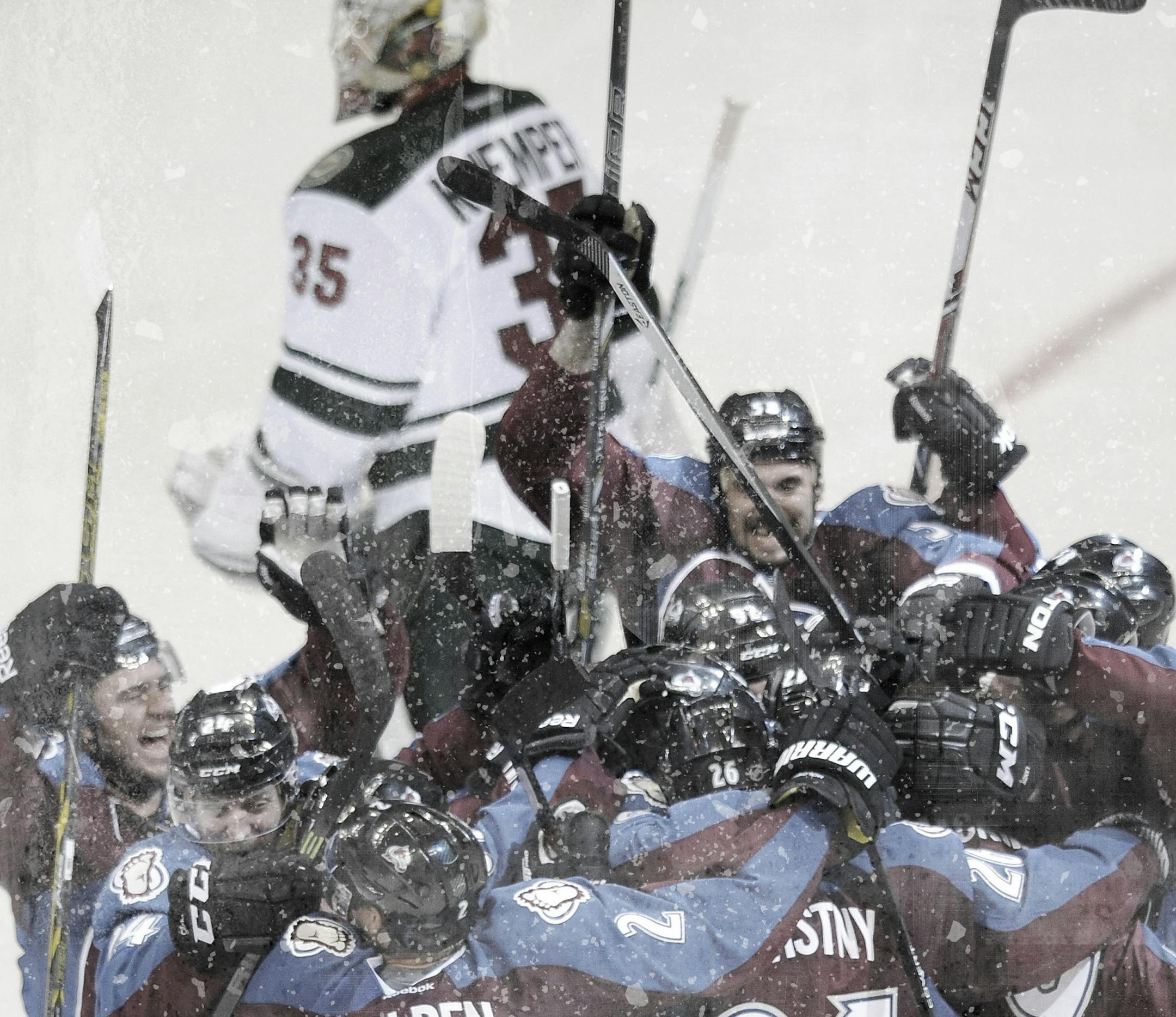 The Colorado Avalanche celebrate as Minnesota Wild goalie Darcy Kuemper skates past after a game-winning goal by Nathan MacKinnon in overtime in Game 5 of an NHL hockey first-round playoff series on Saturday, April 26, 2014, in Denver. The Avalanche won 4-3. (AP Photo/Chris Schneider) ORG XMIT: MIN2014042720441597