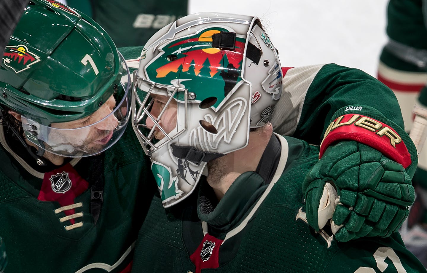 Wild center Matt Cullen and goalie Alex Stalock, who entered Tuesday night's game against Calgary after the first period when Devan Dubnyk was injured, celebrated a 2-1 shootout victory over the Flames.