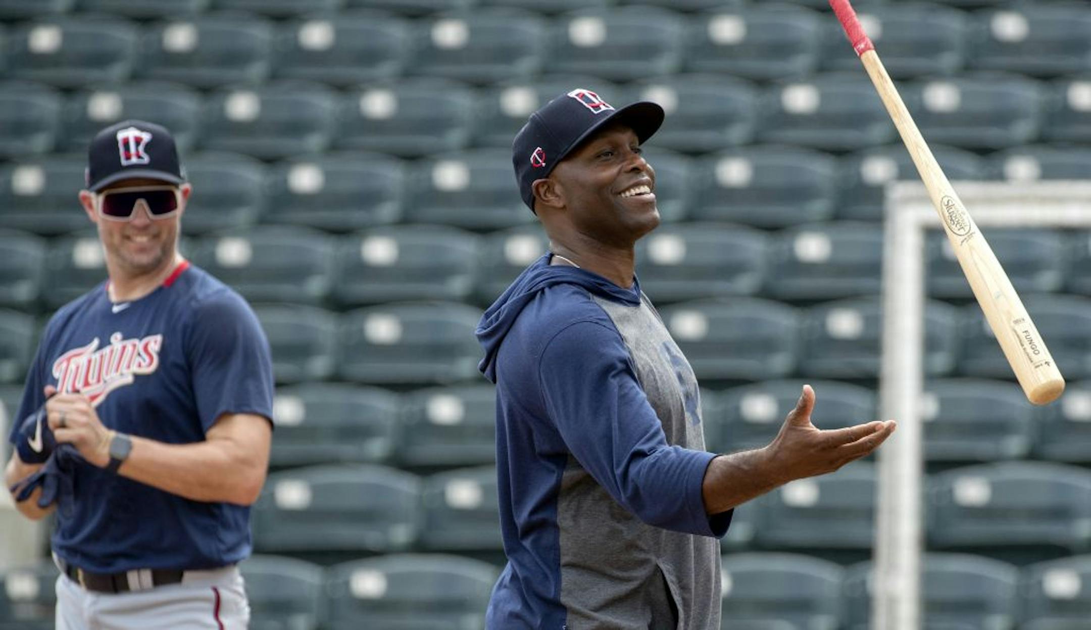 Minnesota Twins special coaches Michael Cuddyer and Torii Hunter joked after hitting balls to outfielders during practice on Wednesday.