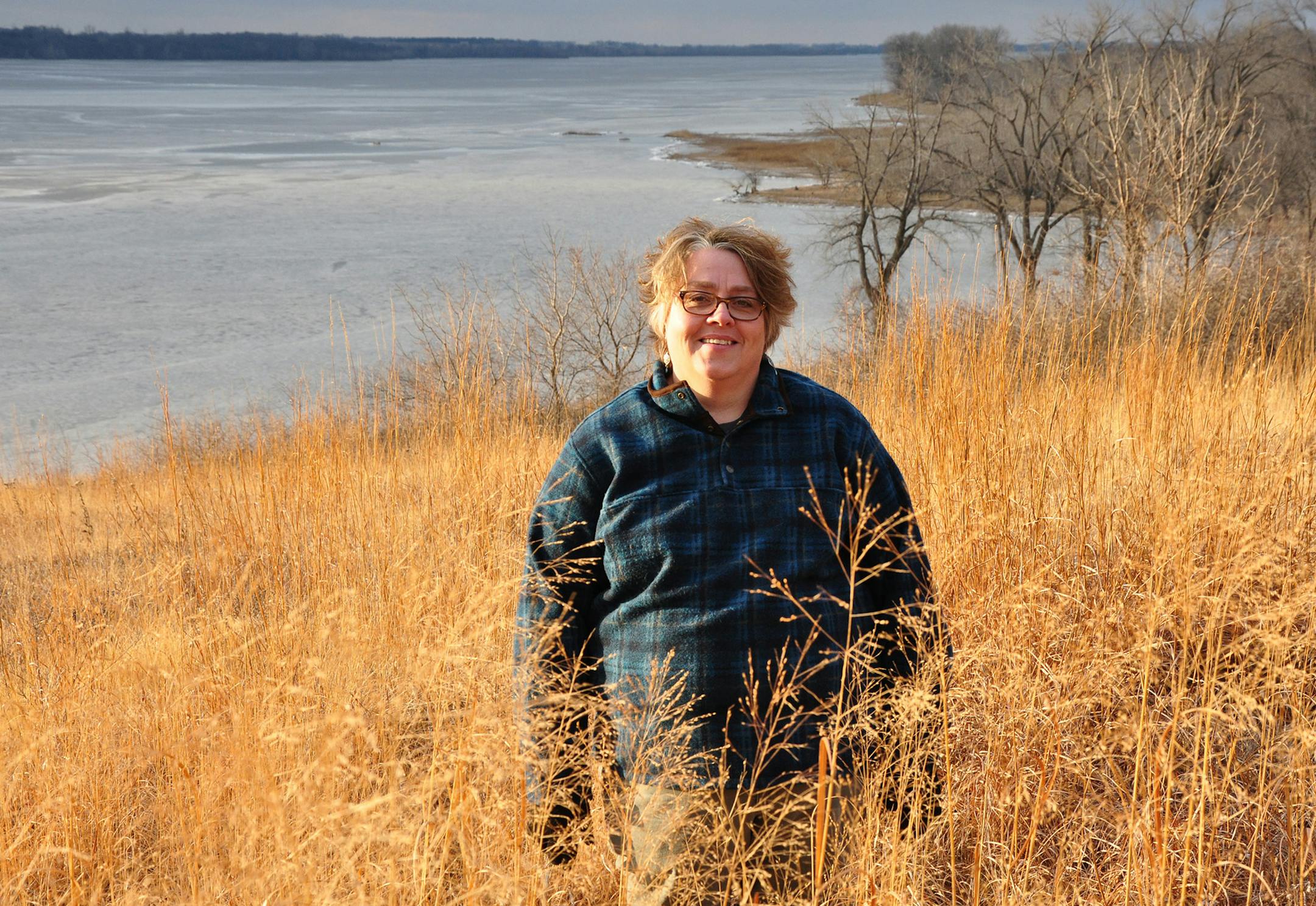 &#xec;Right there, there&#xed;s 50 different plants,&#xee; Amy Rager said of the prairie at Lac Qui Parle State Park near Watson. Rager, state director of the Minnesota Master Naturalist Program since its inception in 2005, has taught Master Naturalist classes here about the prairie and potholes biome. Photo by Ann Wessel