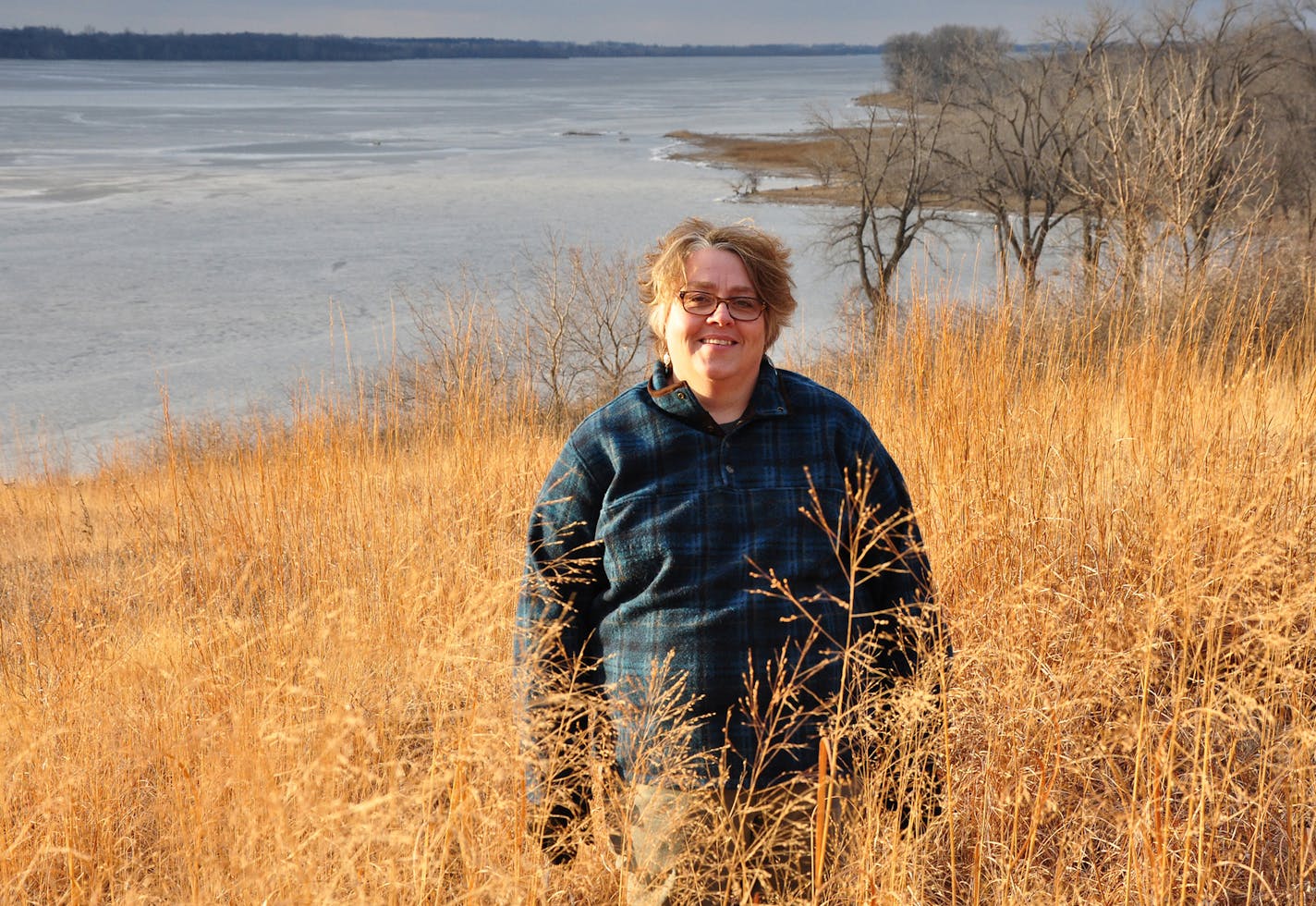 &#xec;Right there, there&#xed;s 50 different plants,&#xee; Amy Rager said of the prairie at Lac Qui Parle State Park near Watson. Rager, state director of the Minnesota Master Naturalist Program since its inception in 2005, has taught Master Naturalist classes here about the prairie and potholes biome. Photo by Ann Wessel