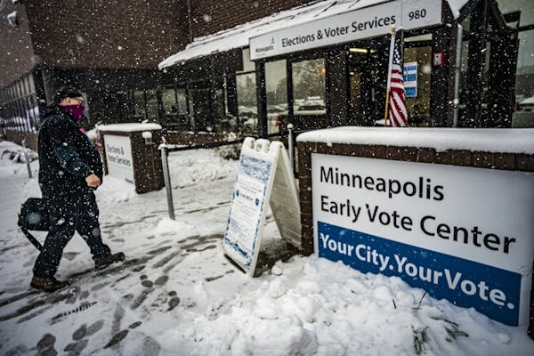 Kilray Beaumont, 59, dropped off absentee ballot requests as well as ballots from his assisted-living complex at the Minneapolis early voting center T