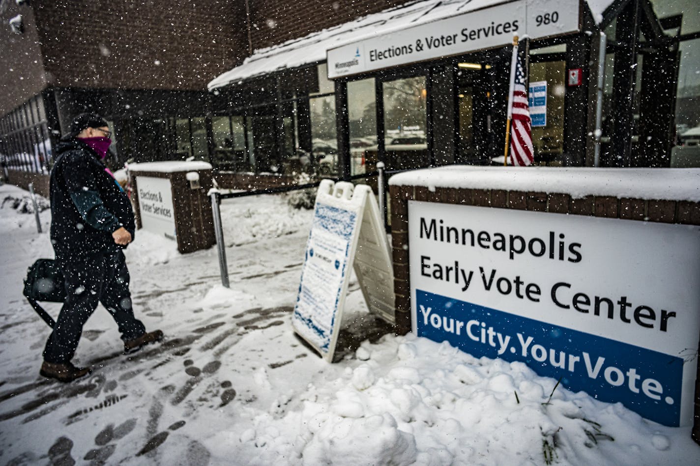 Kilray Beaumont, 59, dropped off absentee ballot requests as well as ballots from his assisted-living complex at the Minneapolis early voting center Tuesday.