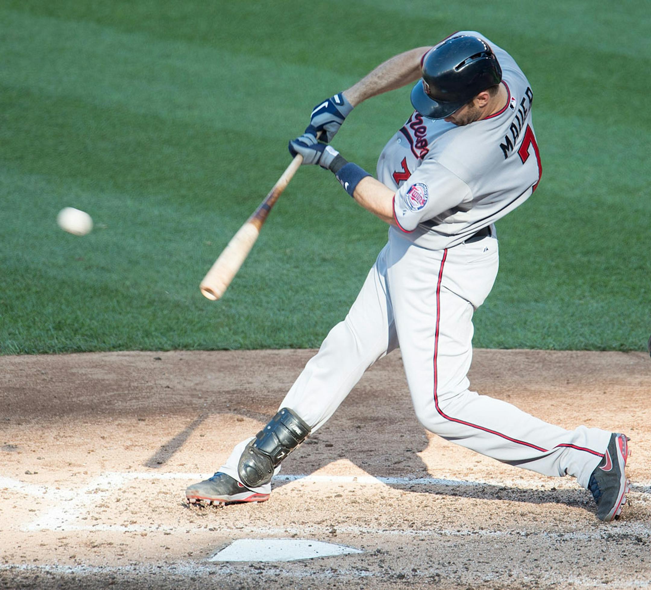 Minnesota Twins catcher Joe Mauer (7) hits a double against the Washington Nationals last week.