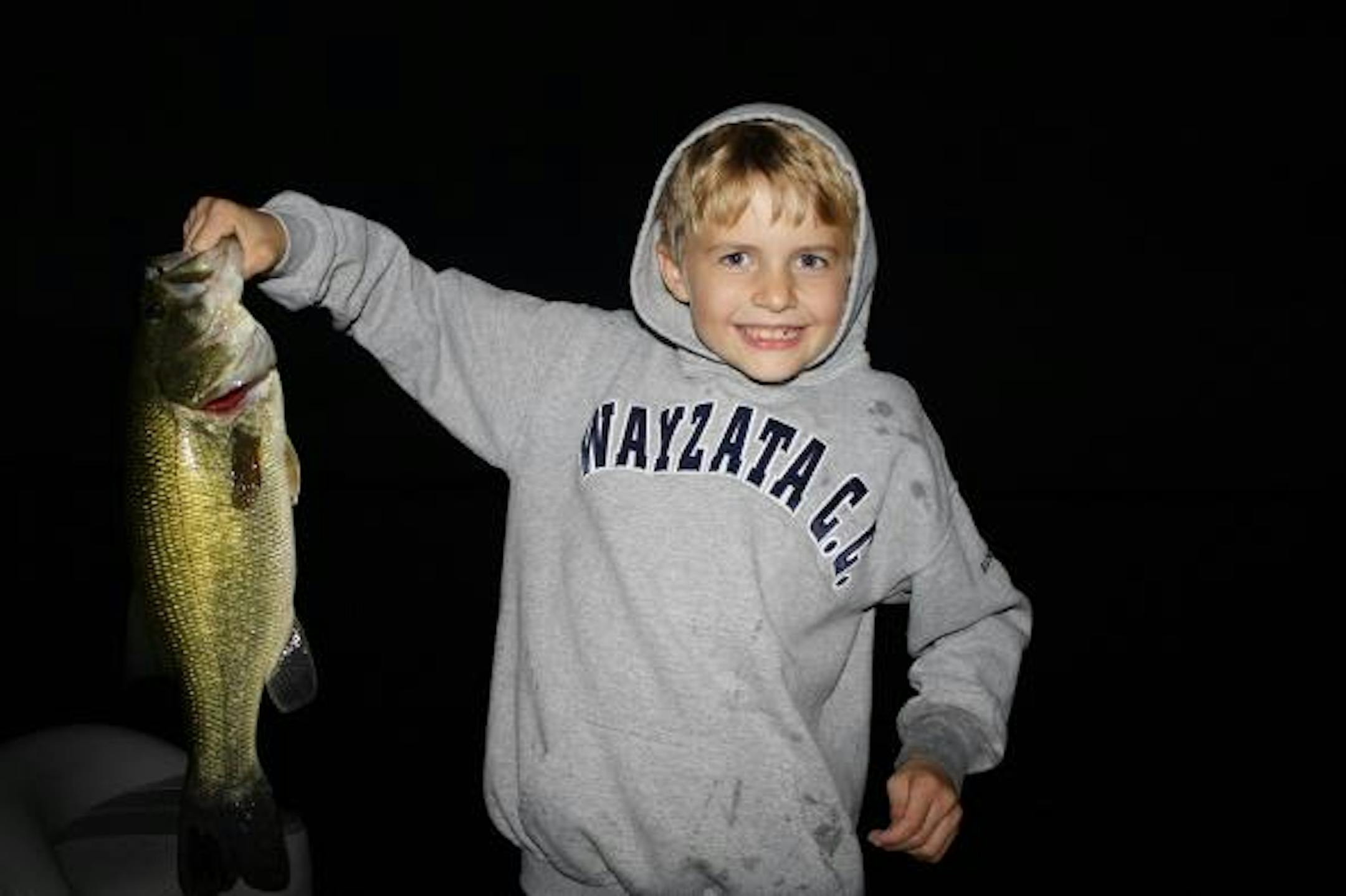 Danny proudly displays his catch of the day when this largemouth struck his muskie topwater lure. A fish that sparked a passion that we cannot put words to!