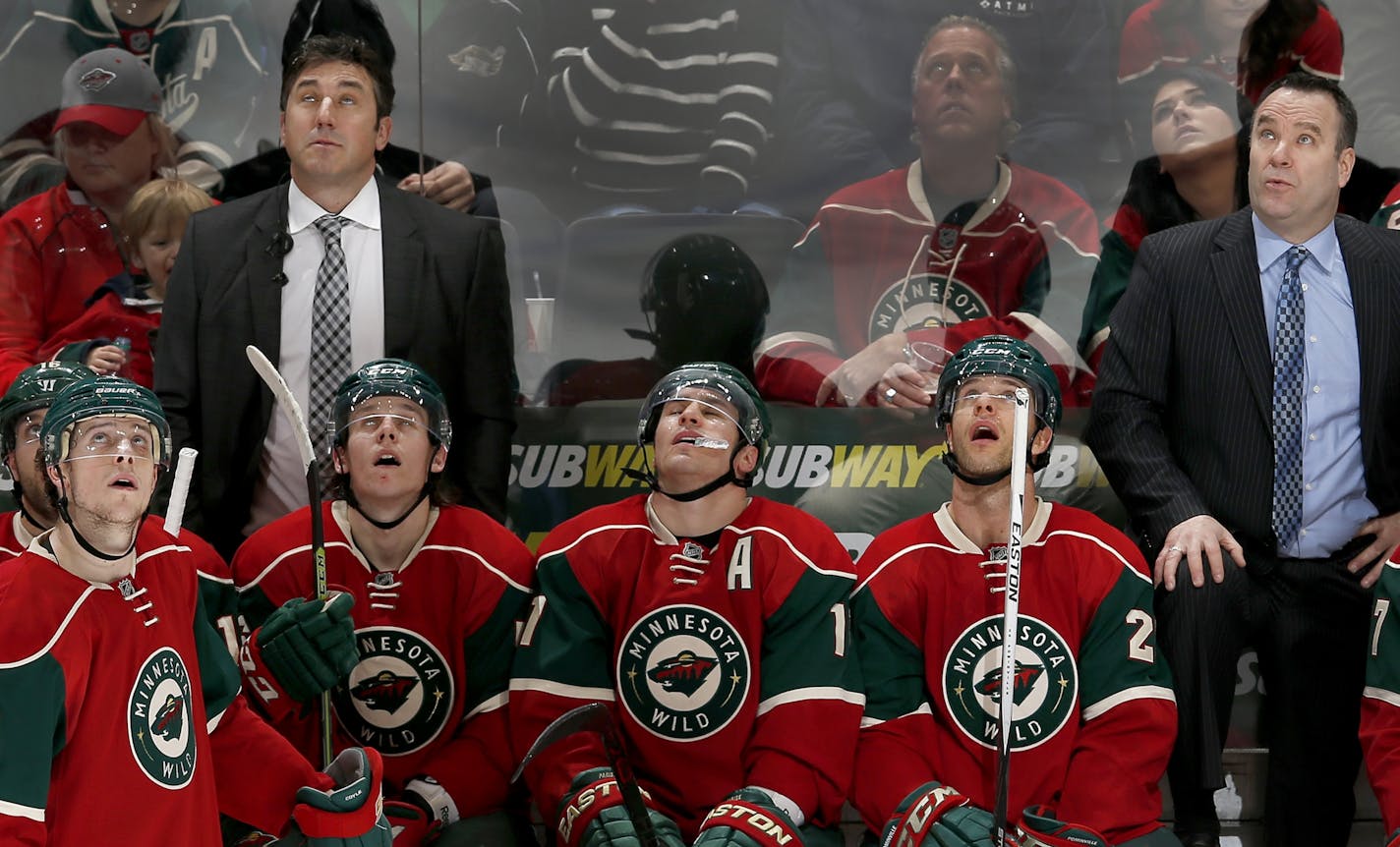 The Minnesota Wild bench looked up at the replay of a goal by San Jose's Patrick Marleau in the third period.