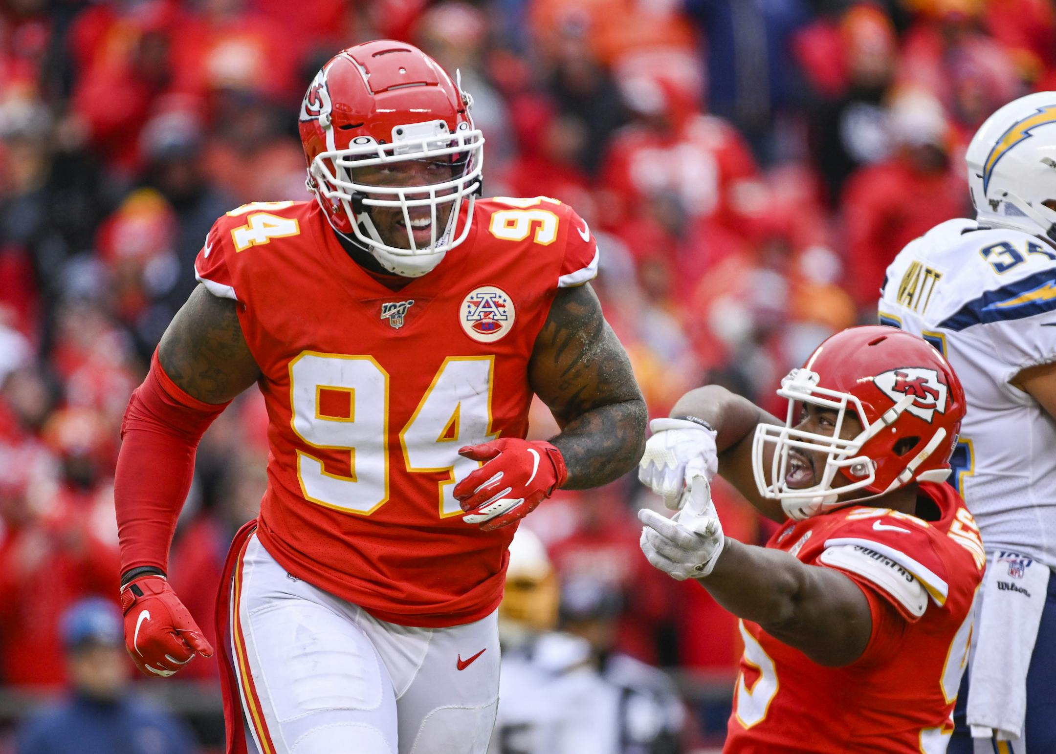 Kansas City Chiefs outside linebacker Terrell Suggs (94) celebrates a sack of Los Angeles Chargers quarterback Philip Rivers (17) during the second half of an NFL football game in Kansas City, Mo., Sunday, Dec. 29, 2019. (AP Photo/Reed Hoffmann) ORG XMIT: NYOTK