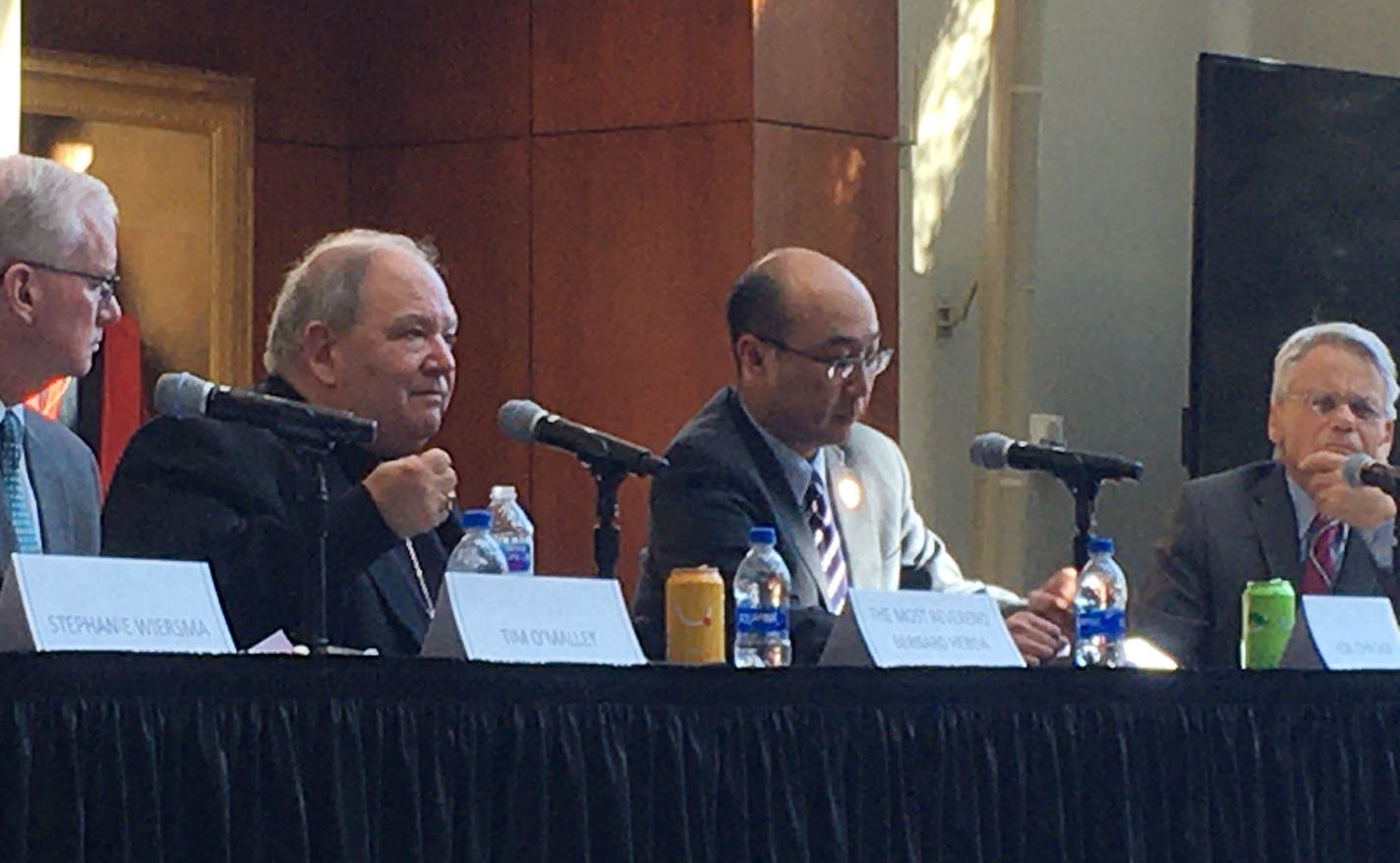 Photo by Jean Hopfensperger
Twin Cities archdiocese leaders shared a panel on restorative justice for clergy abuse issues with Ramsey County Attorney John Choi. Left to right, Tim O&#x2019;Malley, Archbishop Bernard Hebda, Choi and Tom Johnson.