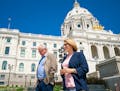 DFL candidate for governor Tim Walz walked to his press conference with his running mate Peggy Flanagan in the State Office Building across the street