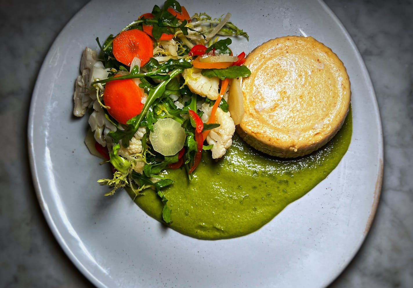 Cauliflower sformato ($13), a delicious, old-school custard, at All Saints in Minneapolis. Jon Cheng, Star Tribune