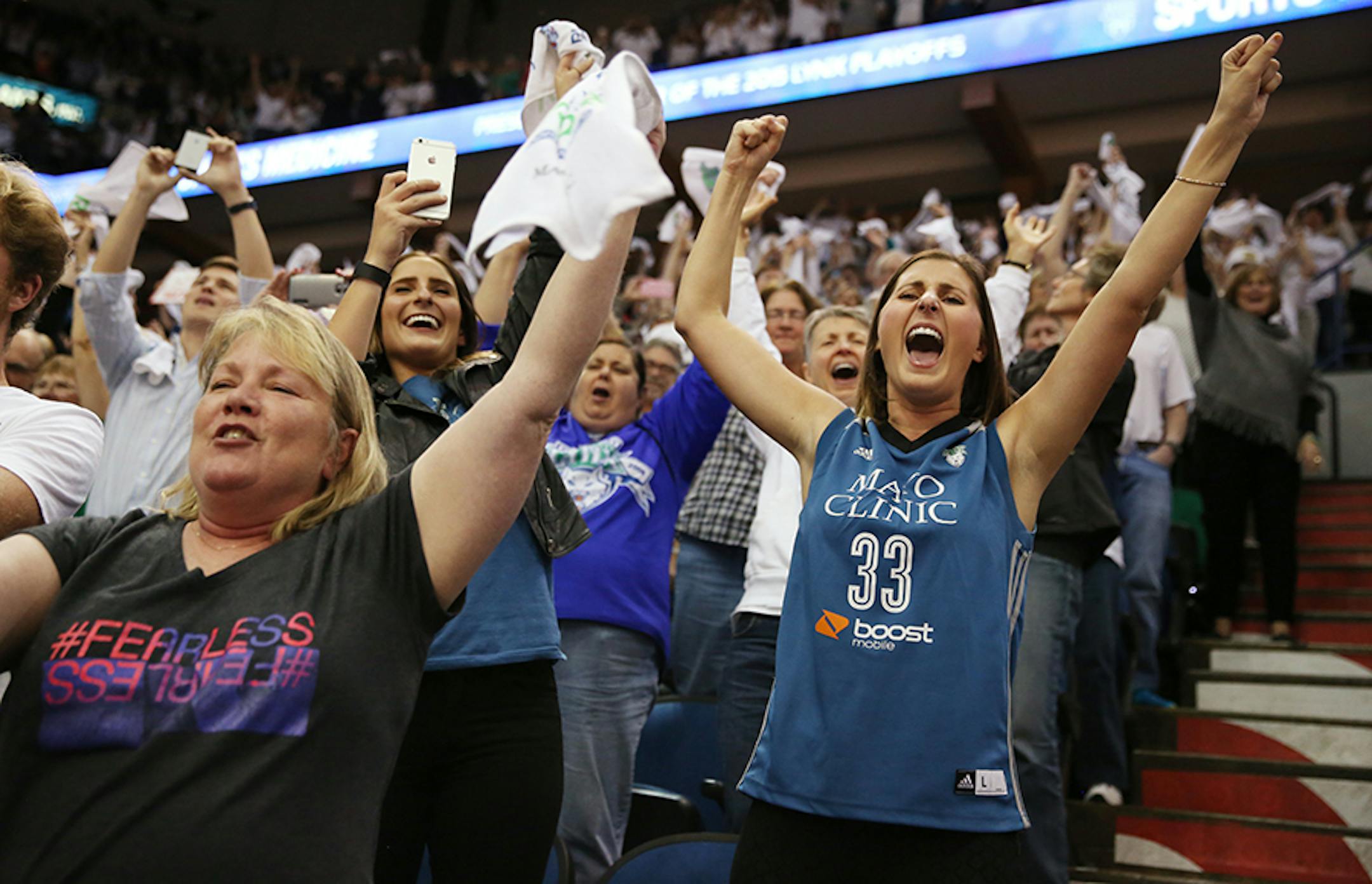 Katelyn Saiko of St. Paul celebrates the Minnesota Lynx winning the WNBA title.