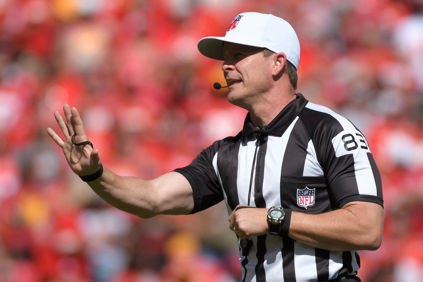 Referee Shawn Hochuli making a call during the first half of an NFL football game between the Kansas City Chiefs and the Los Angeles Chargers, Sunday, Sept. 26, 2021 in Kansas City, Mo. (AP Photo/Reed Hoffmann)