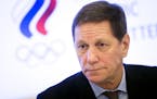 Russian Olympic Committee President Alexander Zhukov speaks to the media after an Russian Olympic committee meeting in Moscow, Russia, Tuesday, Dec. 1